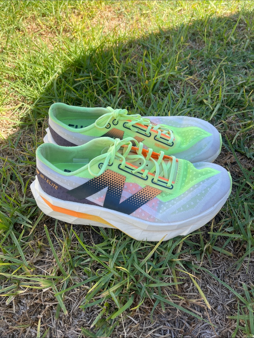 New Balance Kids Neon Green and White Athletic Sneakers with Orange Accent